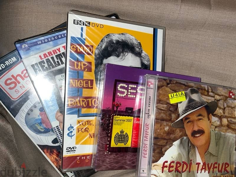 (WORTH 30+ BD For CHEAP) Old unused DVDs سيديات قديمة غالية للبيع ب١٠ 2