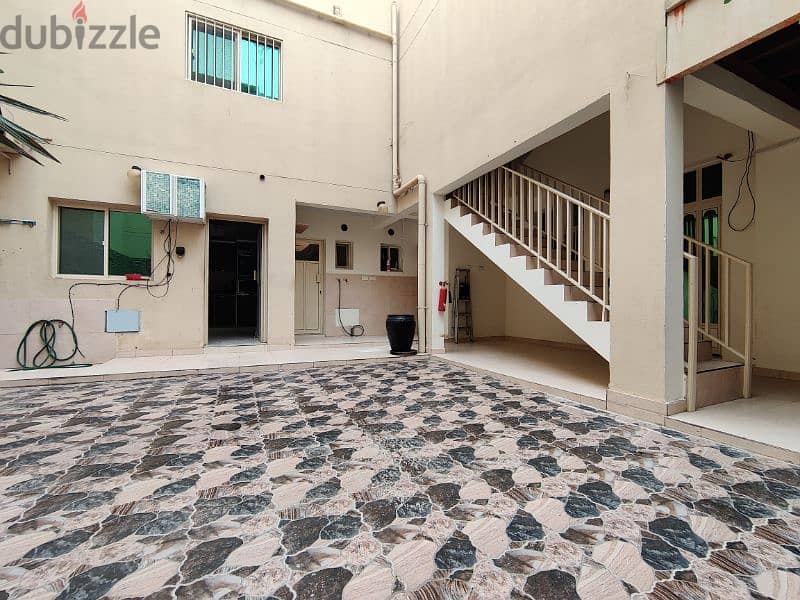 For rent  two-storey house with large hall & patio in A'ali 11