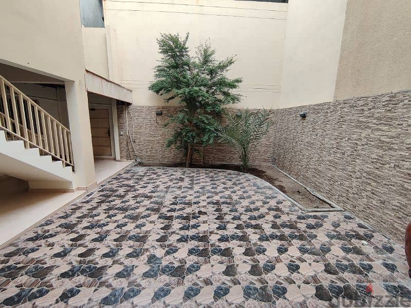 For rent  two-storey house with large hall & patio in A'ali 12