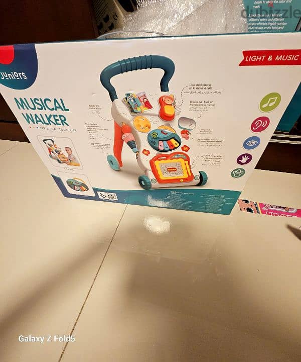 Brand new Juniors Music baby walker 0