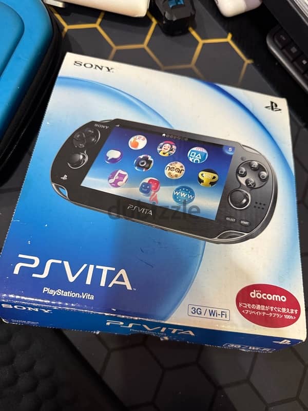 sony psvita 1104 with: box bag usb charger 128gb 1