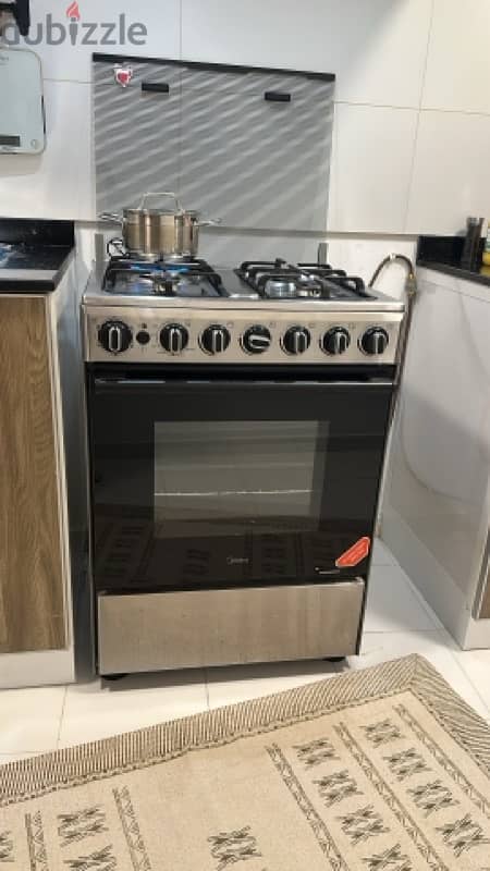 midea 4 burner gas stove and oven 0