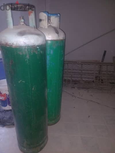 2 big resturent size cylinder with gass