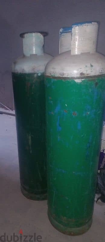 2 big resturent size cylinder with gass 1