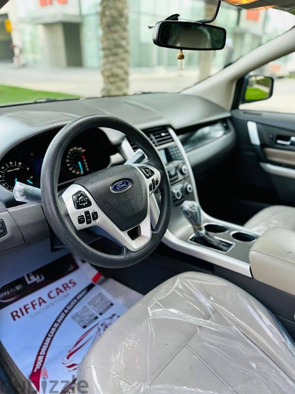 Ford Edge 2013 model. Compact SUV Jeep in very large rear seat with AC 13