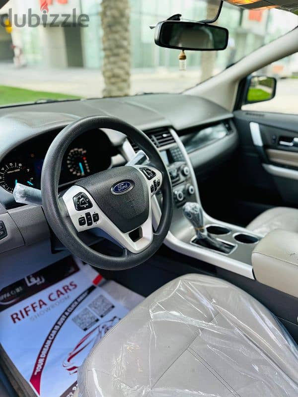 Ford Edge 2013 model. Compact SUV Jeep in very large rear seat with AC 16