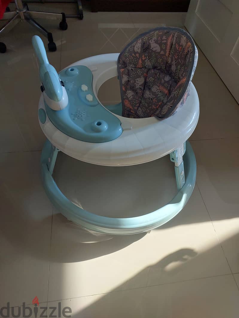 Baby walker and baby rocker for sale 0