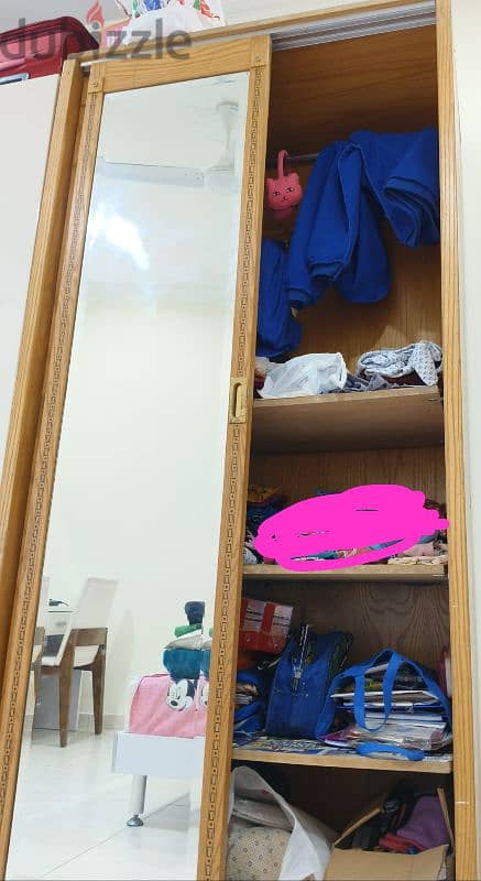 Wooden cupboard with sliding door and soft bed for sale 0