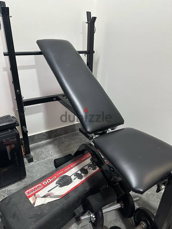 GYM BENCH AND 50KG BARBEL SET (NEGOTIABLE) 0