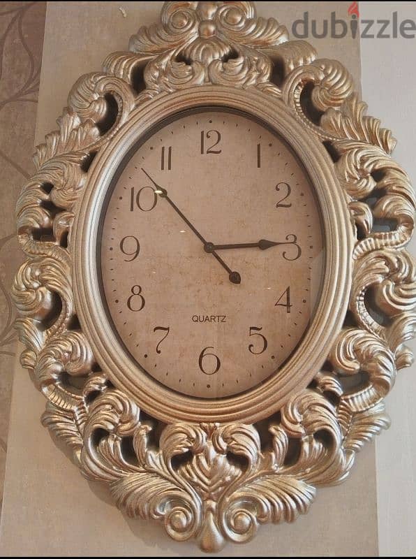 A big & beautiful wall clock selling for 5 bd. 0