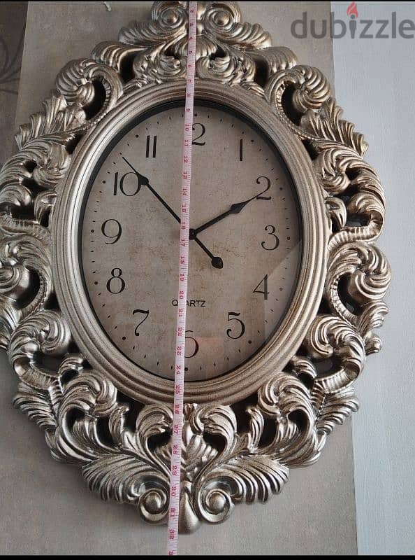 A big & beautiful wall clock selling for 5 bd. 2