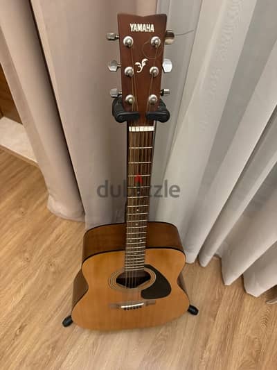 Yamaha guitar with stand