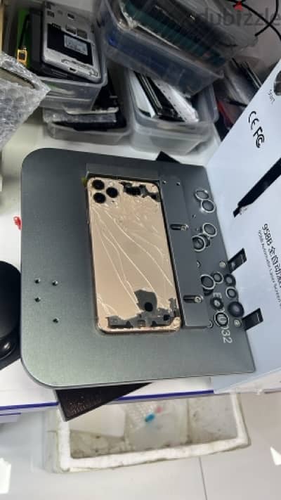 iPhone Back Goass replacement with laser machine .