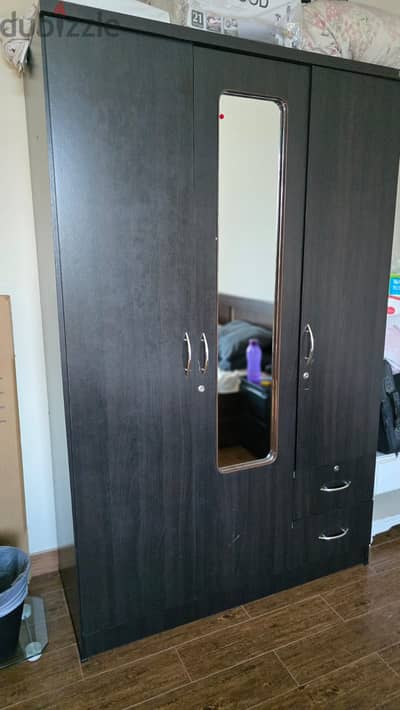 2 door cupboard with mirror and drawers in good condition