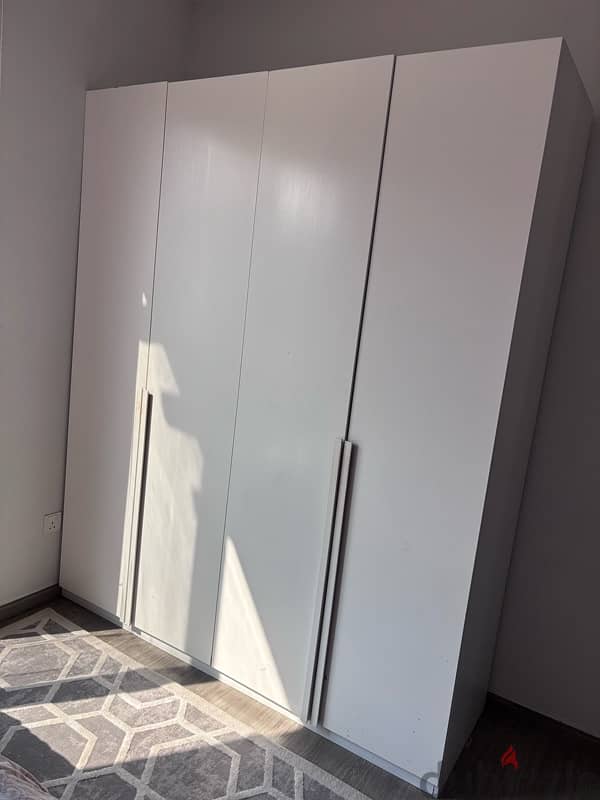 used 4 doors solid wood cupboard for sale 0