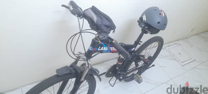 Cycle with helmet for sale