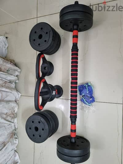 Almost new Dumbells and Barbell bar kit - 20kg