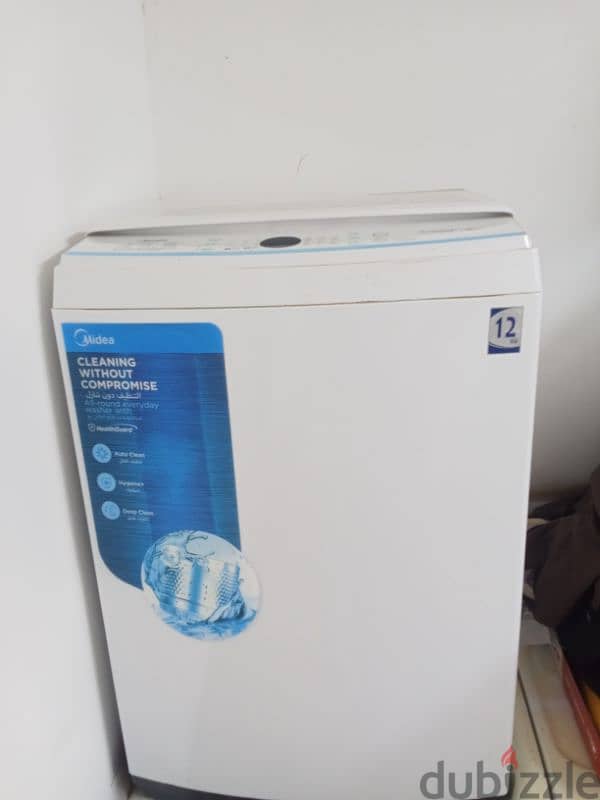 12 kg good condition good working using washing machine for sale 0