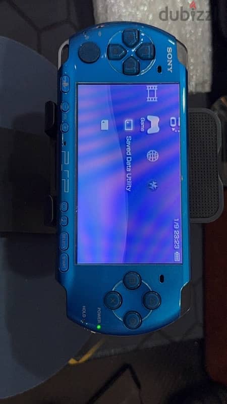 psp 3000, 32gb memory, 50 games, usb charger 1