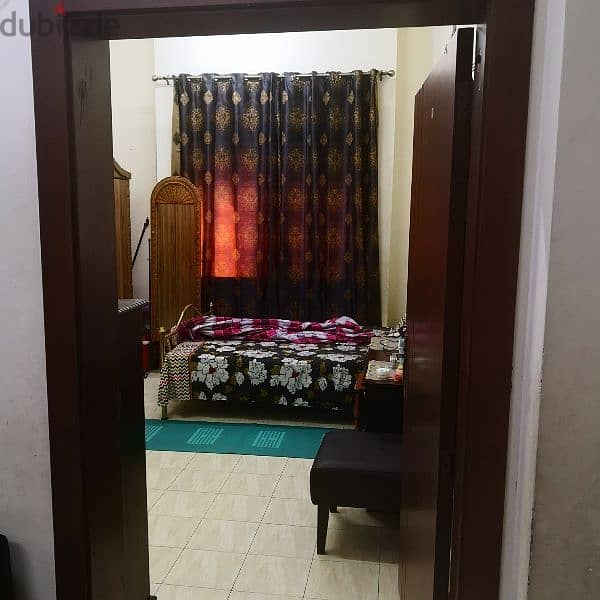 Bed space furnished room for rent in muharaq. 5