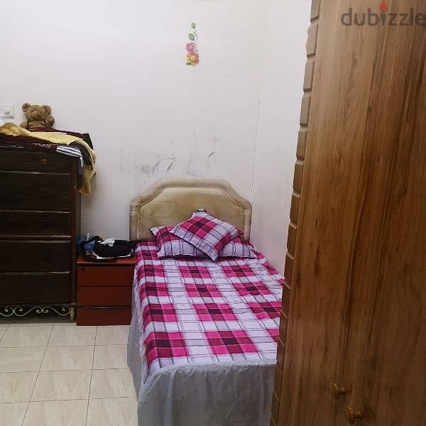 Bed space furnished room for rent in muharaq. 8