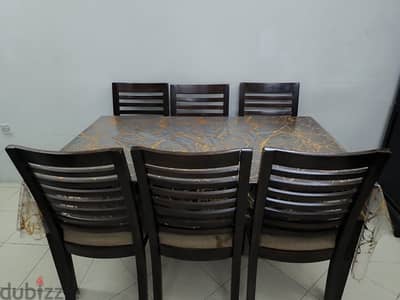 Wooden dining table with 6 chairs