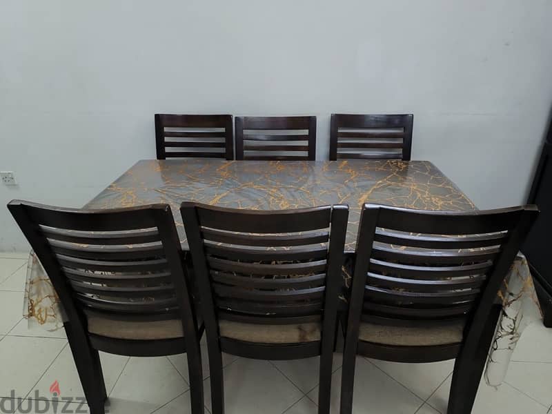 Wooden dining table with 6 chairs 0