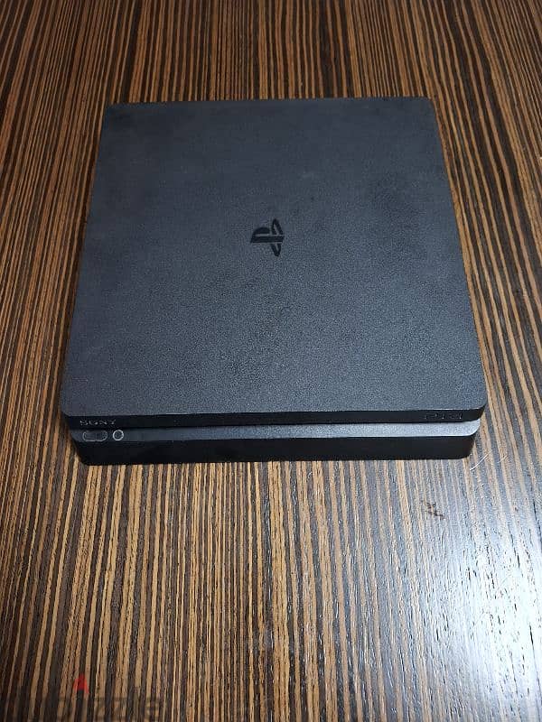 PS4 SLIM 500 GB with 1 controller + 4 games 3