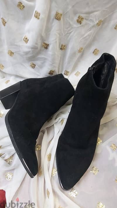 Black suede ankle boots from UK brand Daniel