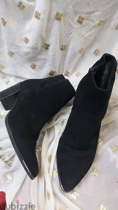 Black suede ankle boots from UK brand Daniel 0