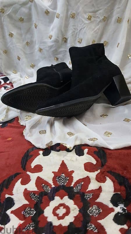 Black suede ankle boots from UK brand Daniel 1