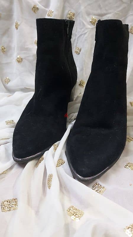 Black suede ankle boots from UK brand Daniel 4