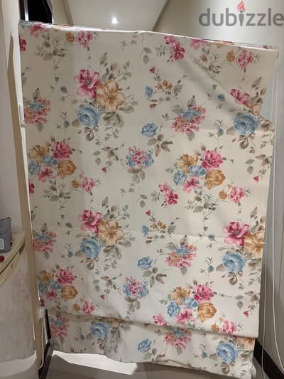 used cupboard and curtains