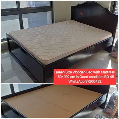 Queen size wooden bed with mattress and other items for sale