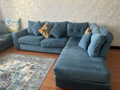 Blue L shaped sofa