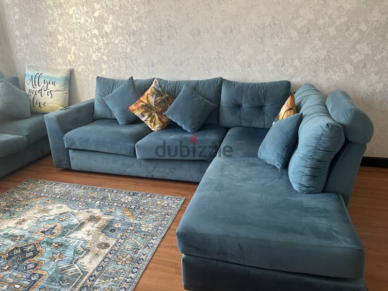 Blue L shaped sofa 1