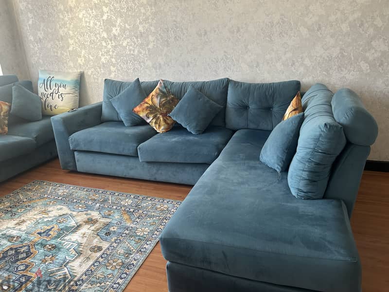 Blue L shaped sofa 2