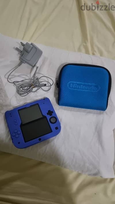 2ds blue console in great condition with silicon protector and its bag