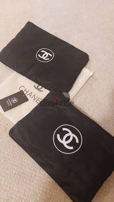 Channel Clutch bags