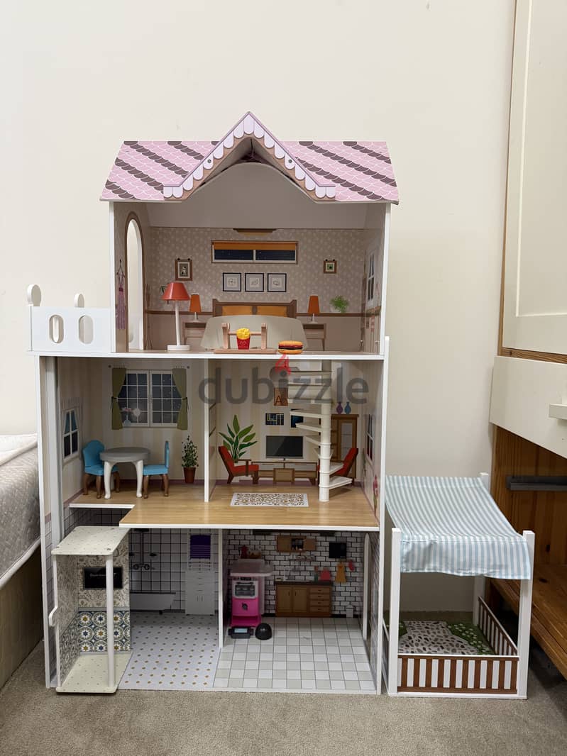 DOLL HOUSE WITH WOODEN FURNITURE AND ALL ACCESSORIES . 8