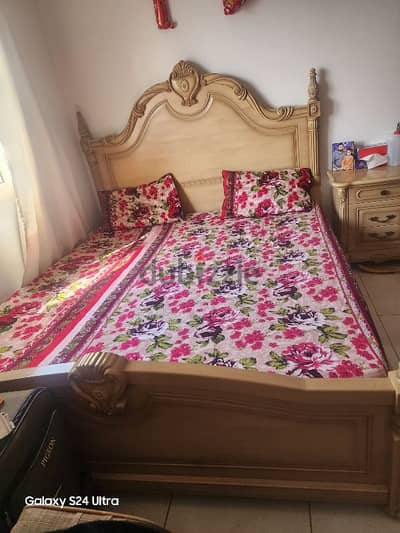 king size bed with 2 side tables