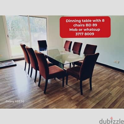 Dinning table with 8 chairs and other household items for sale