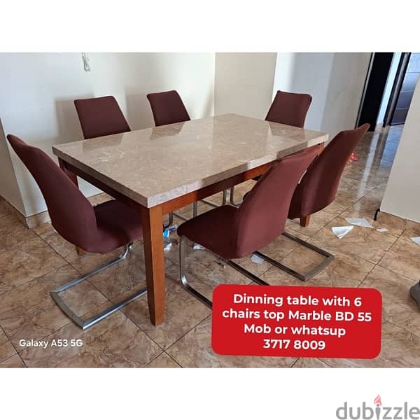 Dinning table with 8 chairs and other household items for sale 8