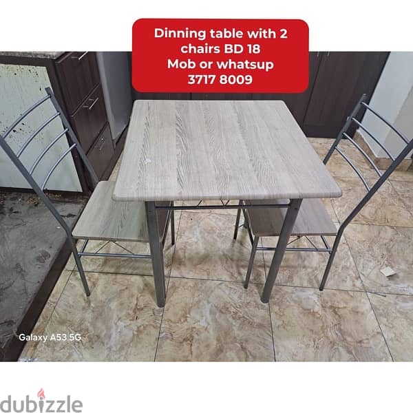 Dinning table with 8 chairs and other household items for sale 12