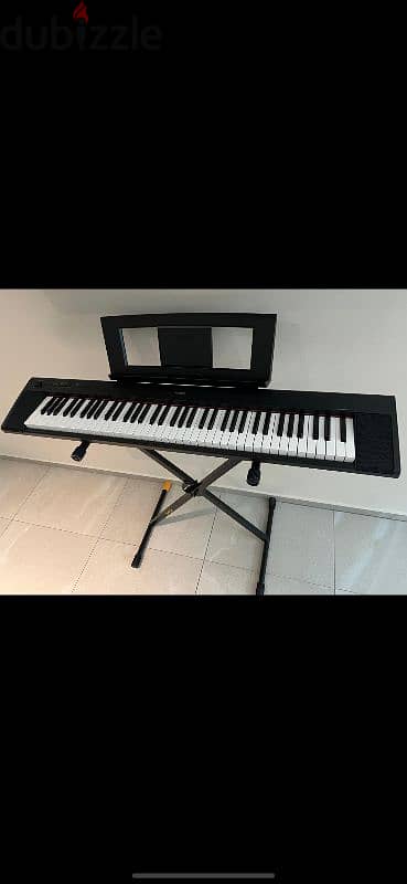 Piano Keyboard (with stand) for sale