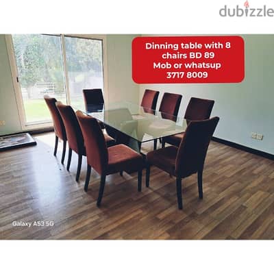 Dinning table with 8 chairs and other household items for sale