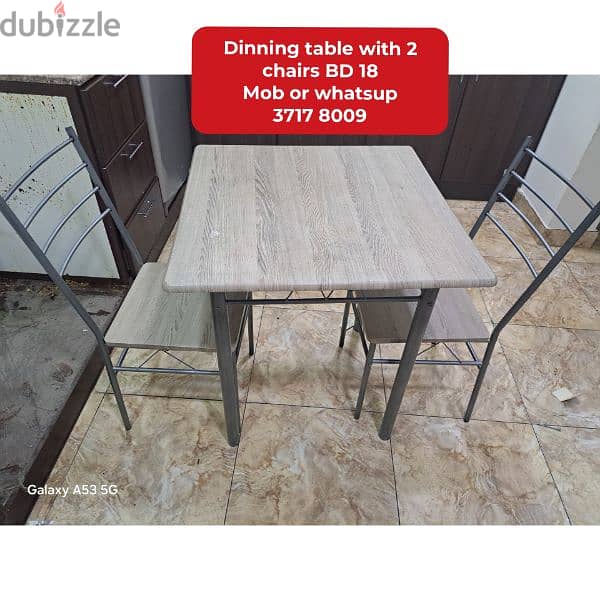 Dinning table with 8 chairs and other household items for sale 11