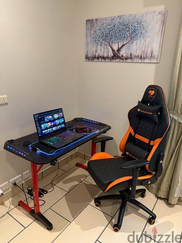 cougar gaming chair and deadskull gaming table 1