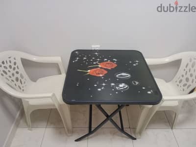 Dining table with two chairs