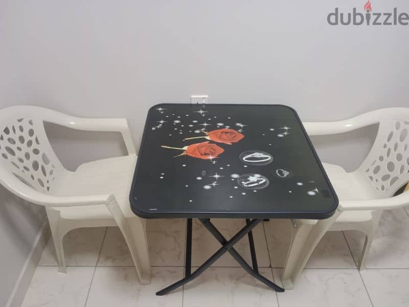 Dining table with two chairs 0